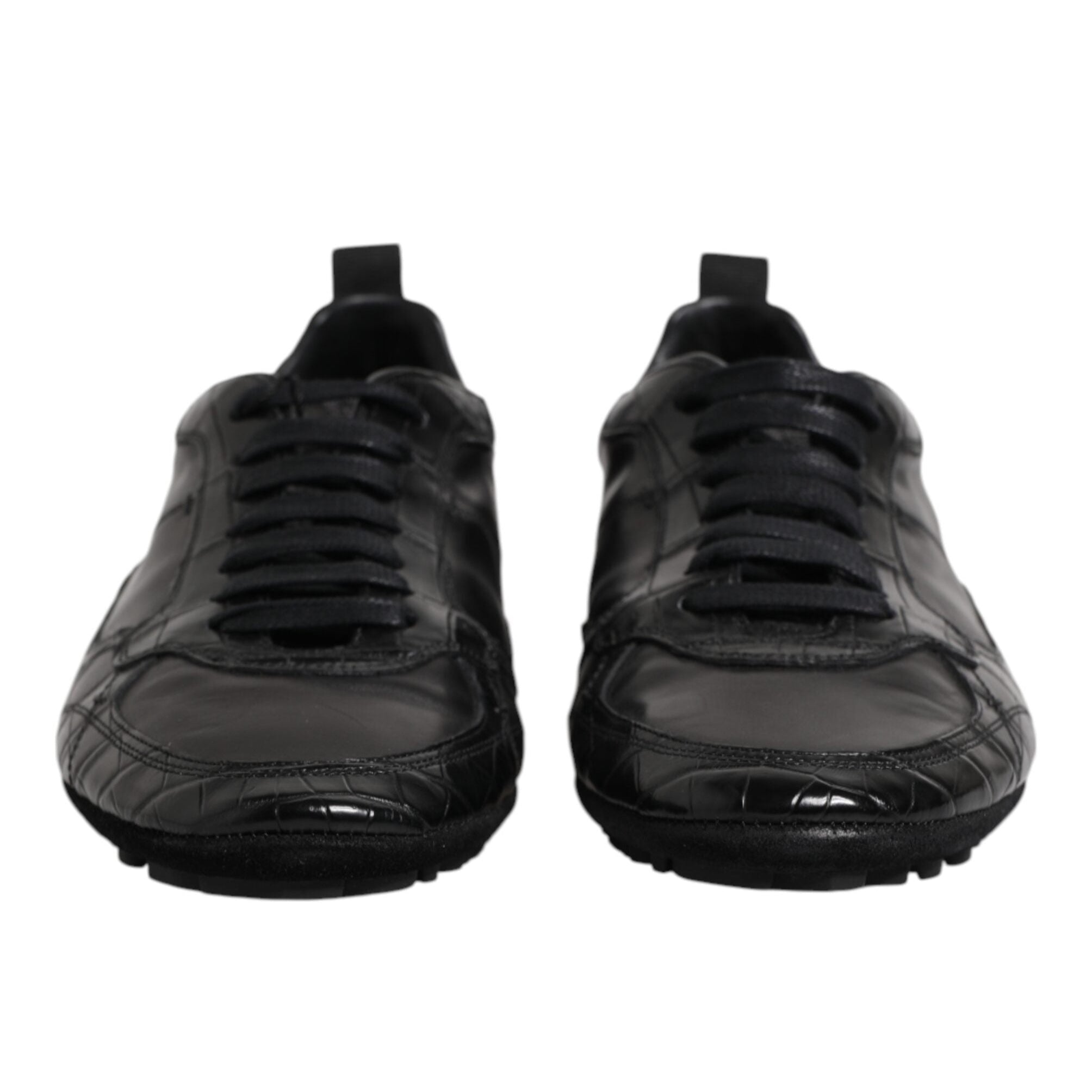 Pair of black sneakers on a white background