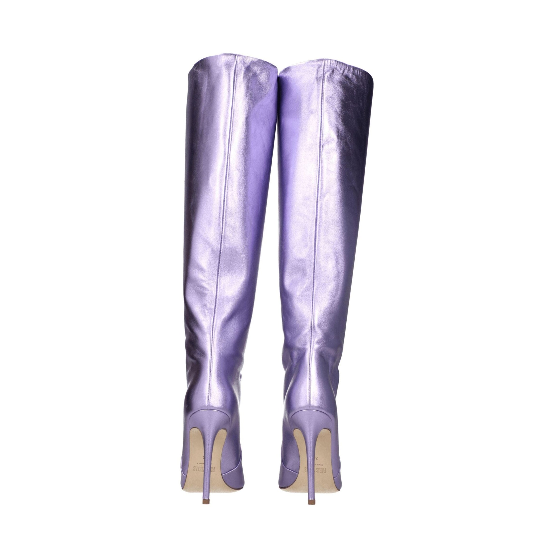 Pair of purple knee-high boots on a white background