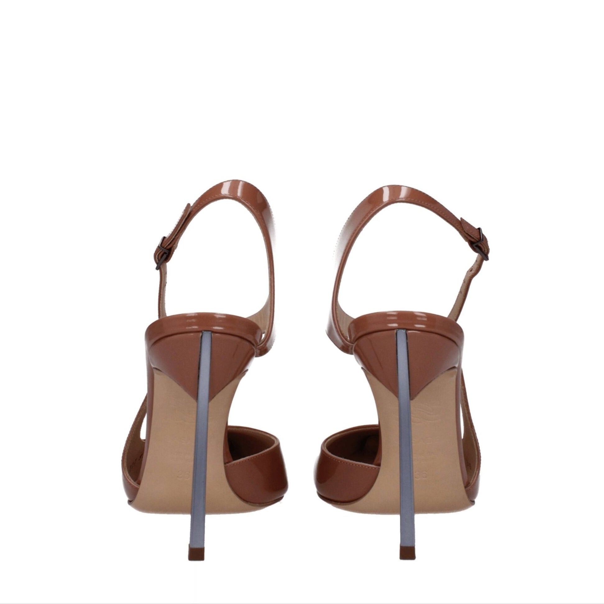 Pair of brown high-heeled shoes on a white background