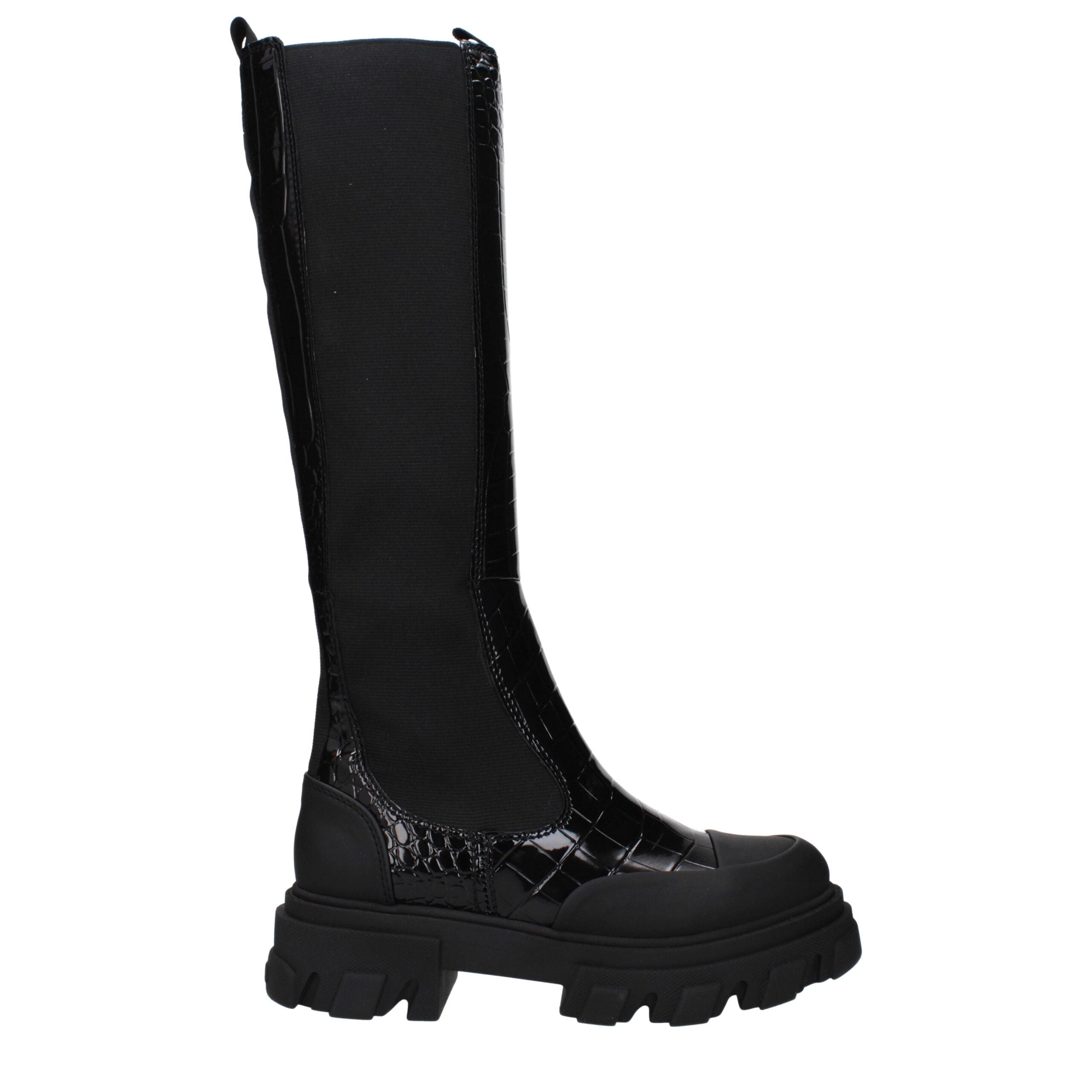 Black knee-high boot with a platform sole on a white background