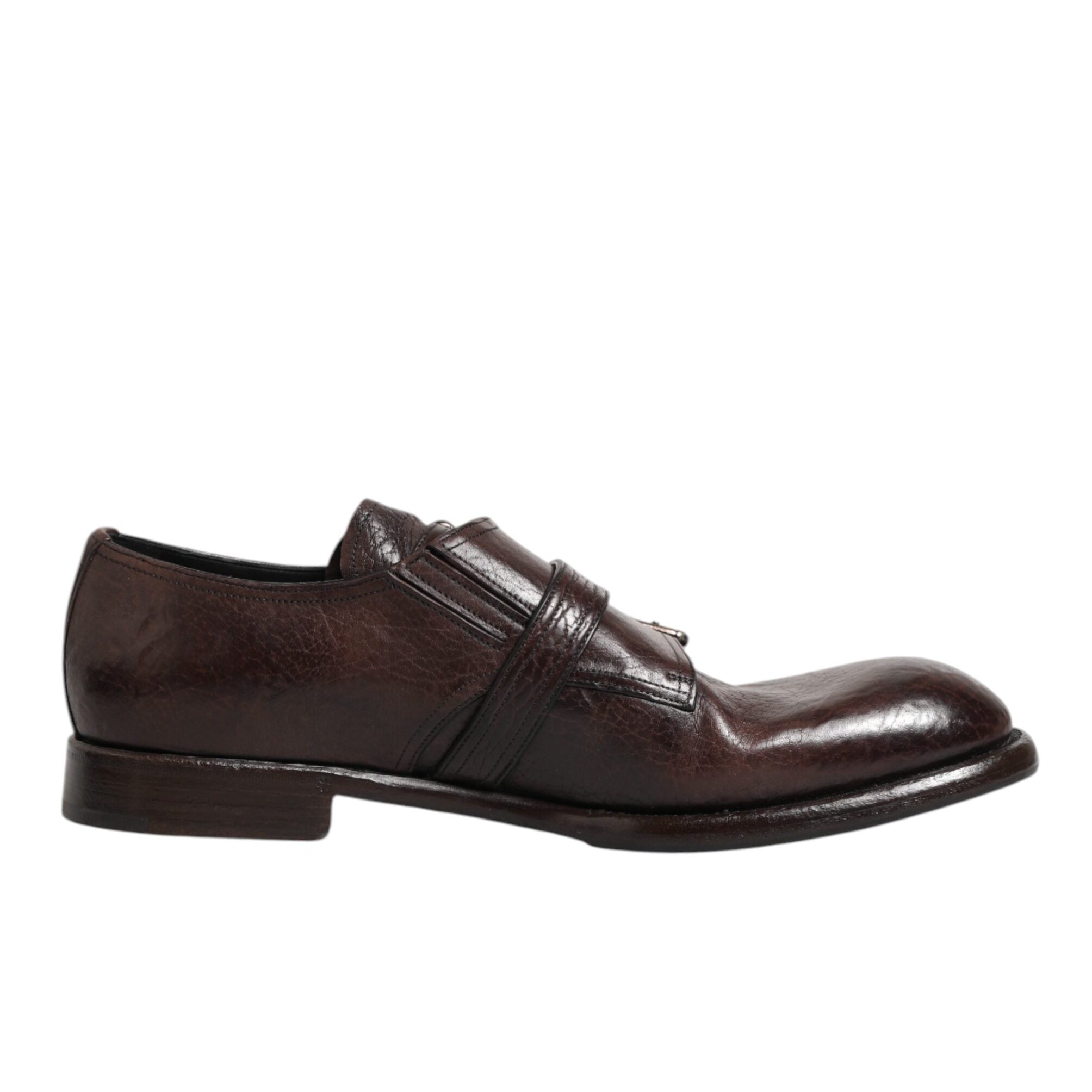 Brown leather shoe on a white background