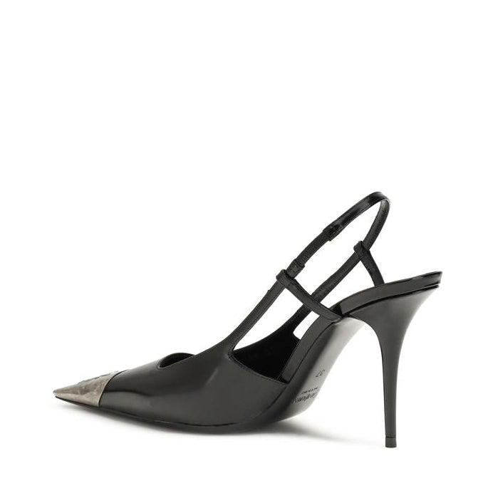 Black high-heeled shoe with a stiletto heel on a white background
