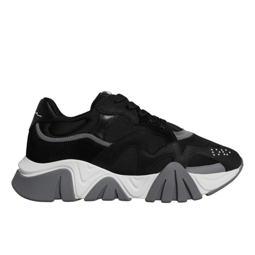 A pair of black leather mesh chunky low-top sneakers with a lace-up closure and white sole.