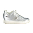 Silver sneaker with a brand logo on a white background