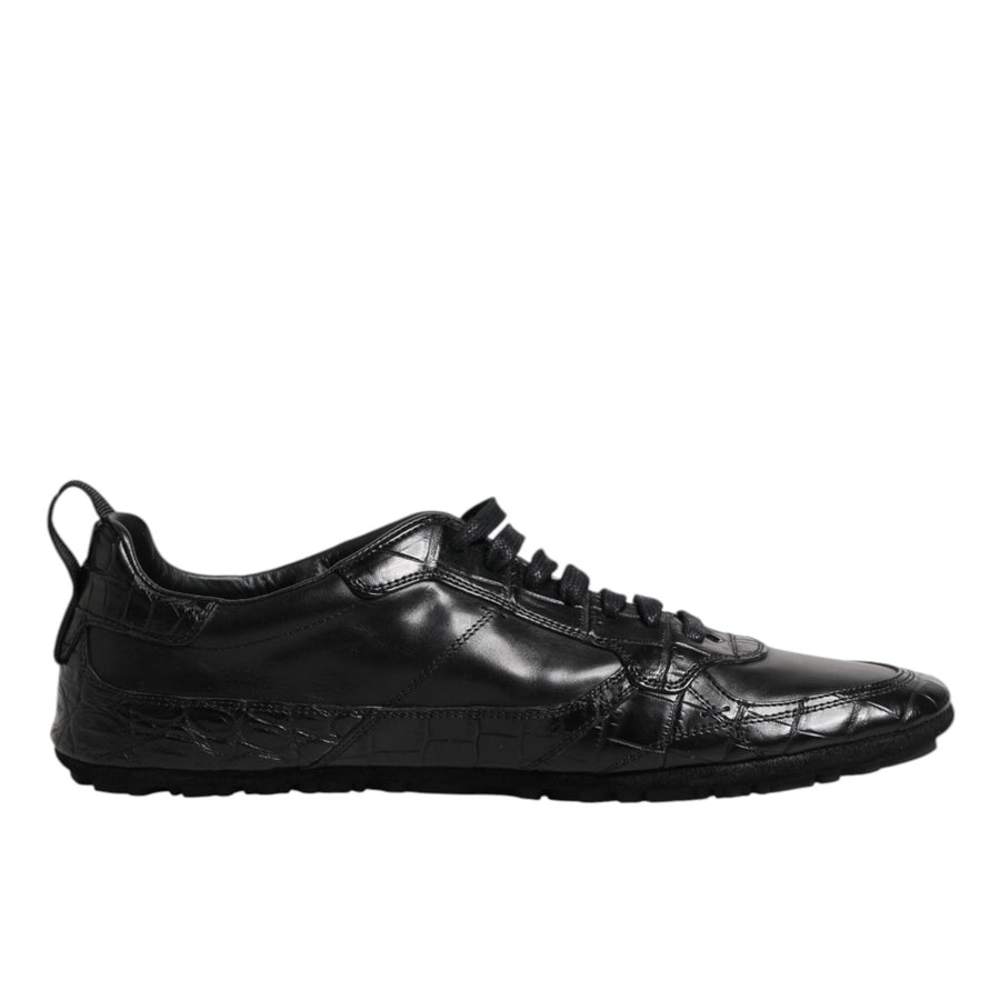Black leather sneaker on a white background