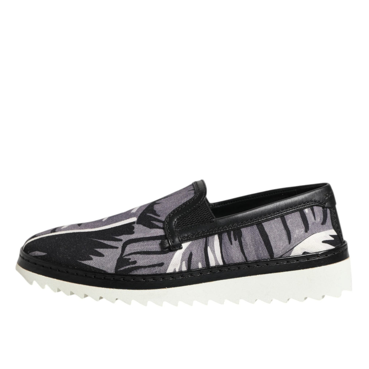Black and white slip-on shoe on a white background