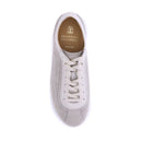 White sneaker with laces on a white background