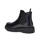 Black Chelsea boot on a white background