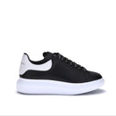 Black and white sneaker on a white background