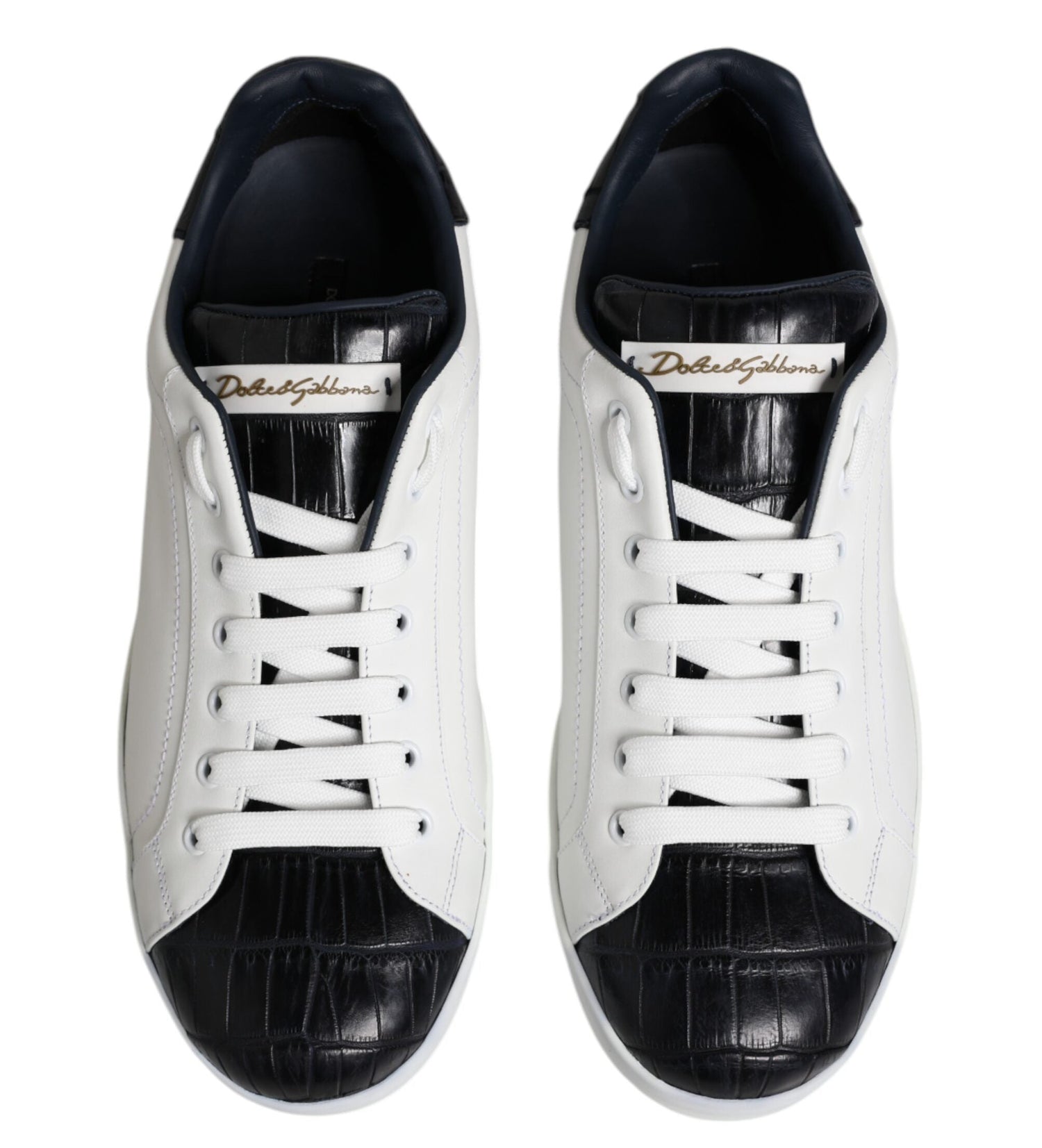 White sneakers with black accents on a white background