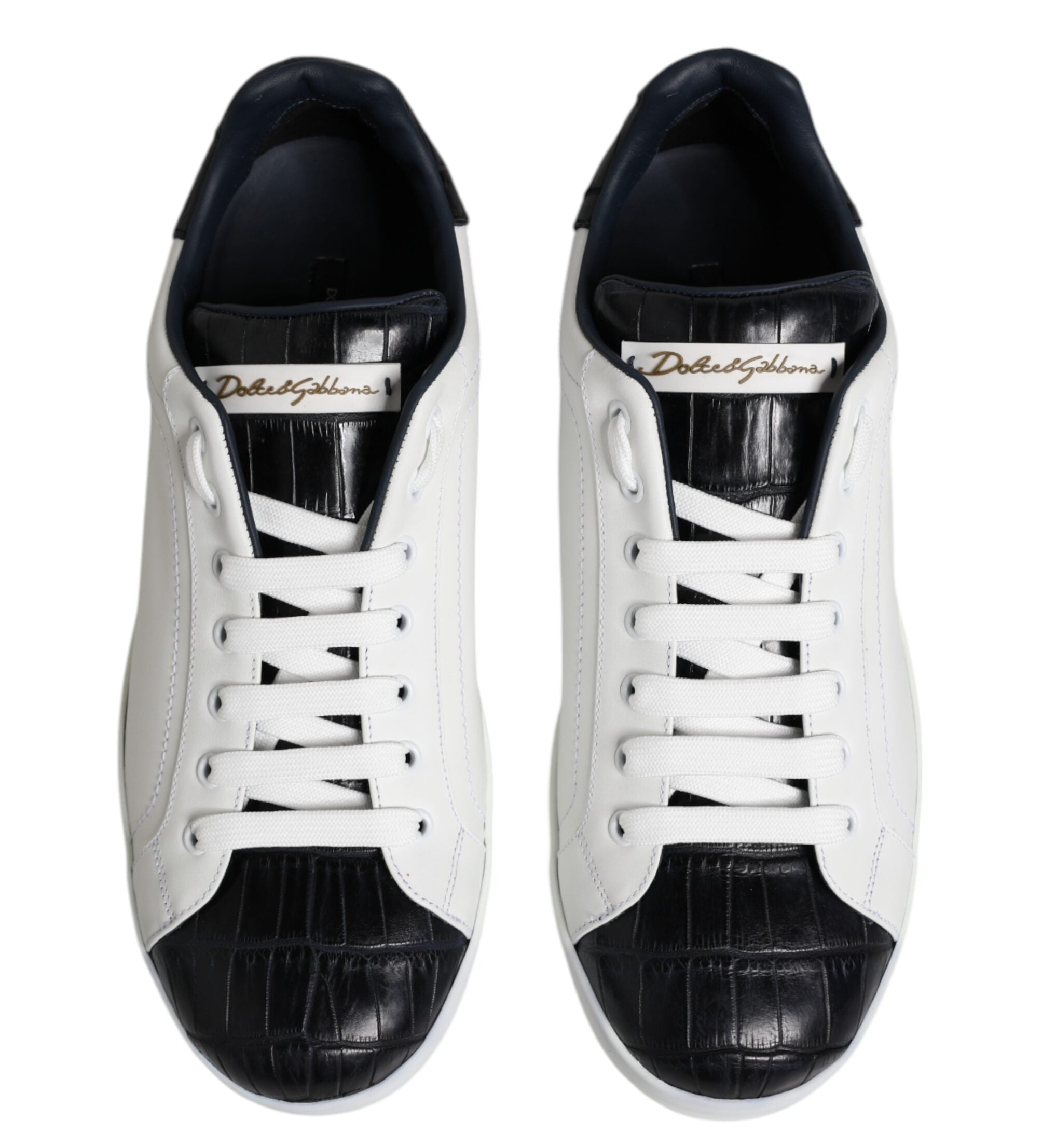 White sneakers with black accents on a white background