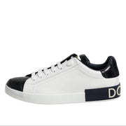 White sneaker with black accents on a white background