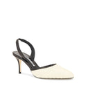 White high-heeled shoe with black slingback on a white background