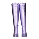 Pair of purple knee-high boots on a white background