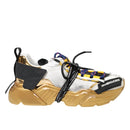 White and gold sneaker with colorful laces on a white background