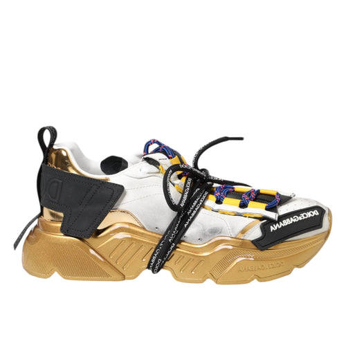 White and gold sneaker with colorful laces on a white background