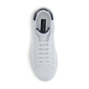 White sneaker with black accents on a white background
